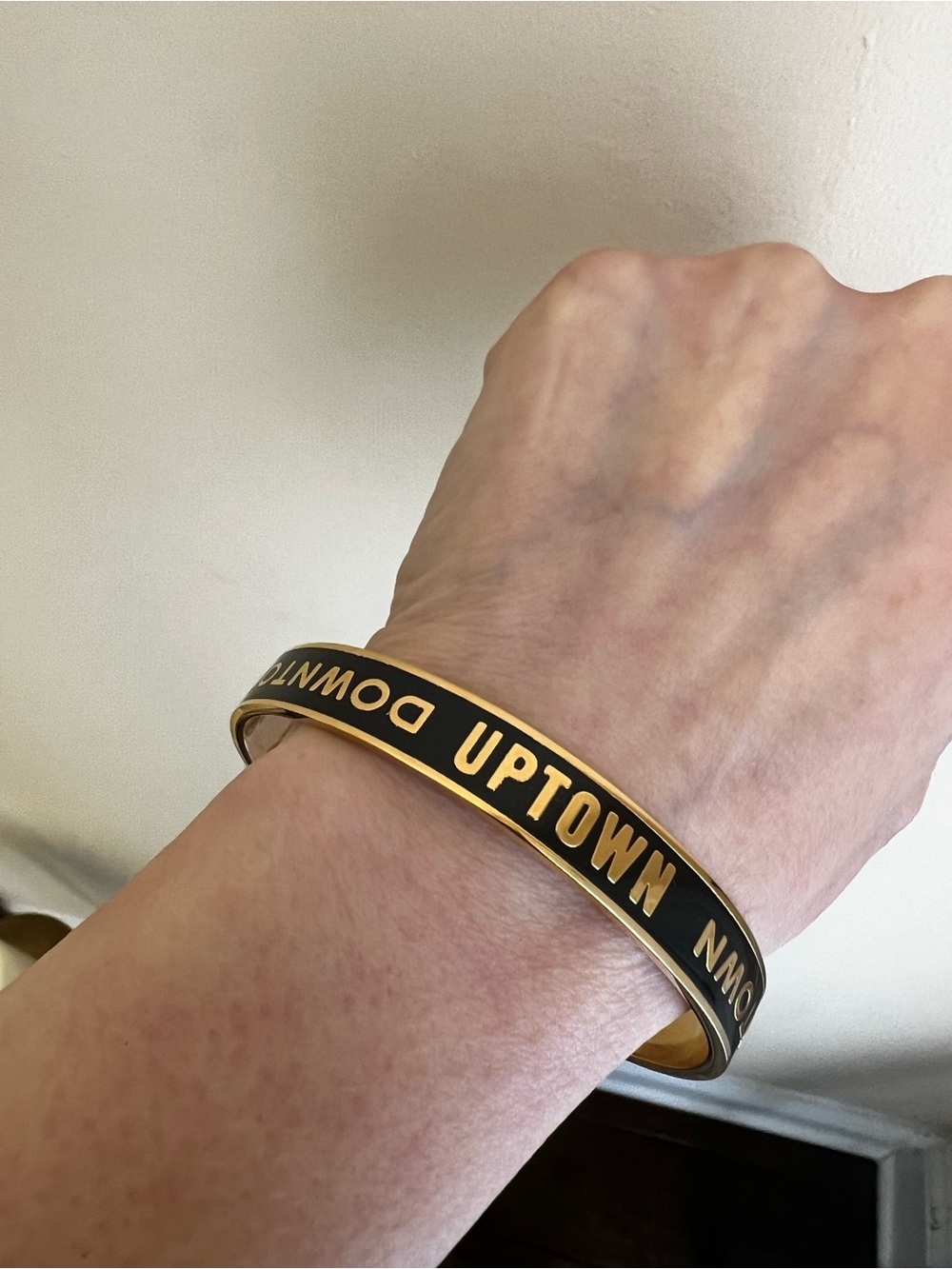 Kate Spade, New York-Uptown/Downtown, Black/Gold Glossy Enamel Bangle.
